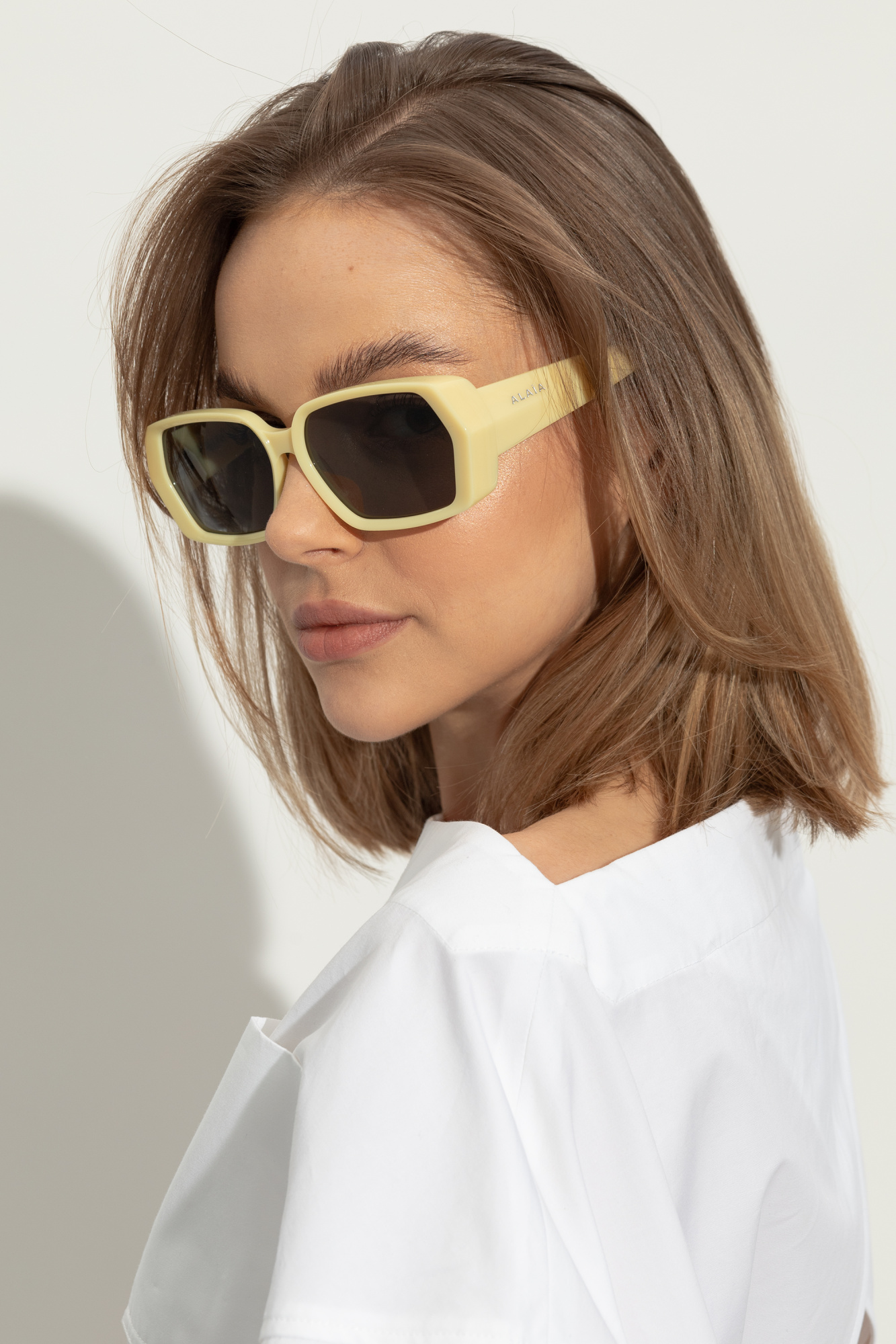 sunglasses are one such pair - Yellow logo sunglasses Alaïa
